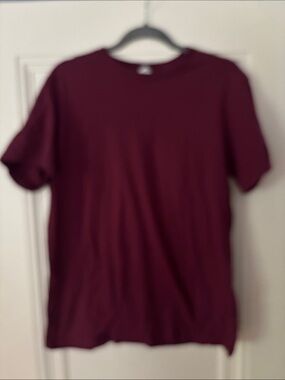 Men's Short Sleeve Crew Tee in Deep Burgundy. DOMINIC FIKE logo on back.